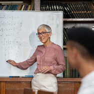 Older Person at a whiteboard 