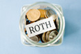 jar of coins with the word ROTH on top