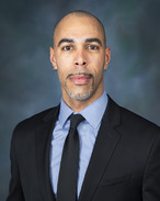 Professional headshot of Anthony Estell