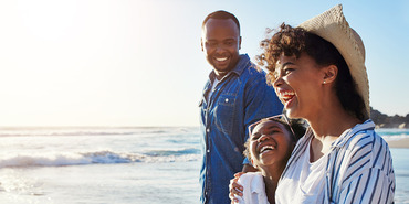 Family of color on a beach