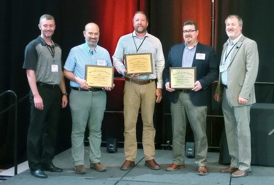 Ottawa County and its project partners accept the award at the Michigan Infrastructure Conference.