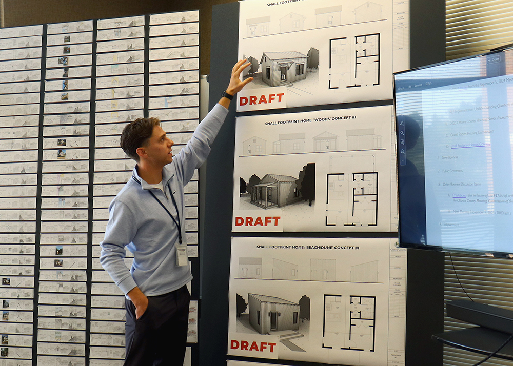 Hope College undergrad and Department of Strategic Impact intern Matt Daub goes over preliminary small-home concepts.