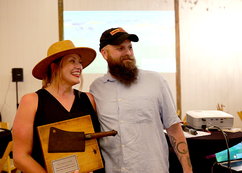 Gina and Cory Mitchell of The Beard and the Gal pose with the Harvest Knife.