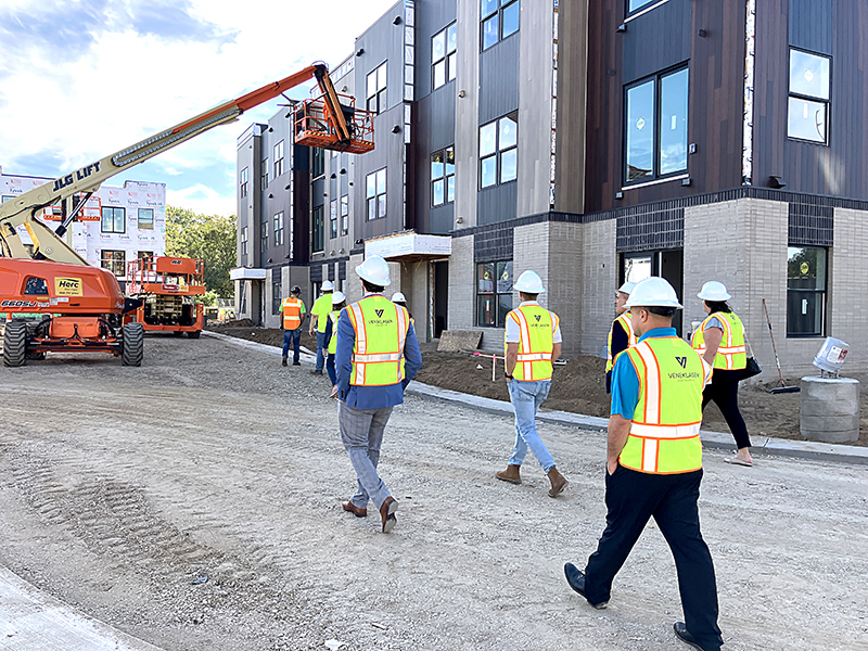  Group tours Terra Station, a new brownfield TIF-supported mixed-use development in Hudsonville on Oct. 2.