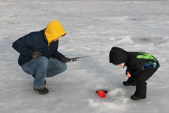 Program participants ice fishing