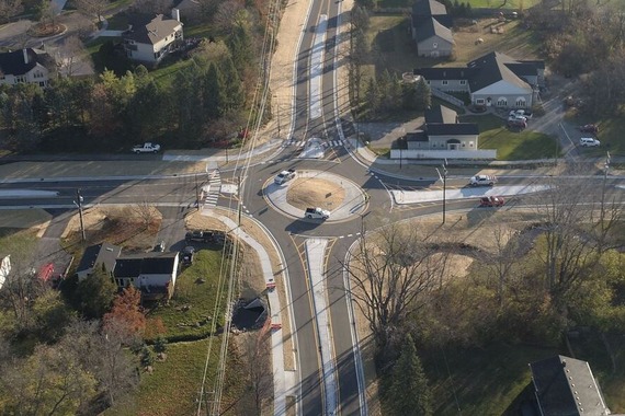 An aerial photograph of a roundabout traffic feature 