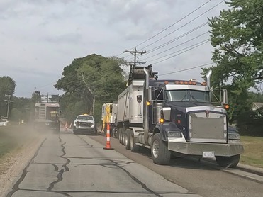 Photo of a milling machine removing pavement on Fillmore Street in 2024 