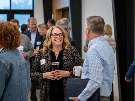 Local government attendees networking at Vision Summit