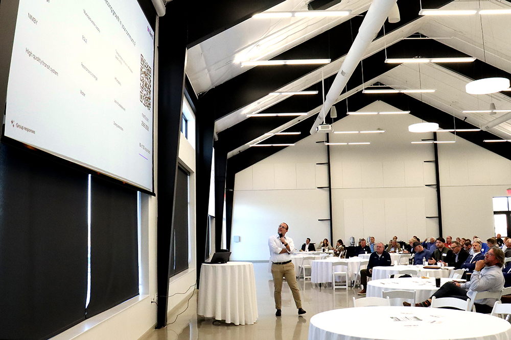 Joe Pierce facilitates live survey during Visioning for Growth Summit event.