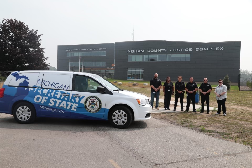 MDOS and Ingham County Jail employees with Mid-Michigan SOS mobile office