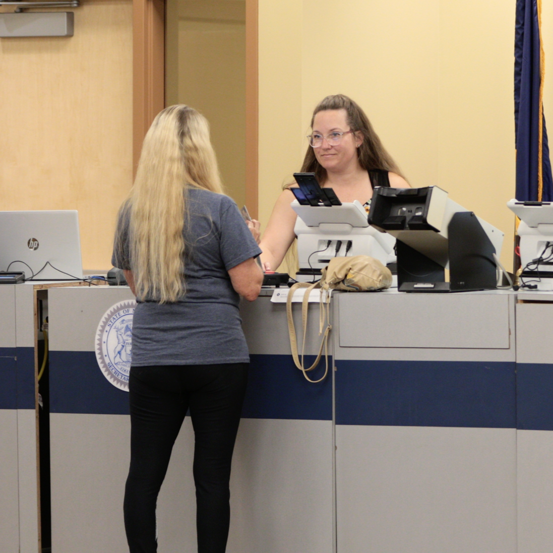 Mobile office staff assists a resident