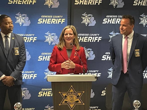 Deputy Sheriff Percy Glover, Secretary Benson, Sheriff Swanson