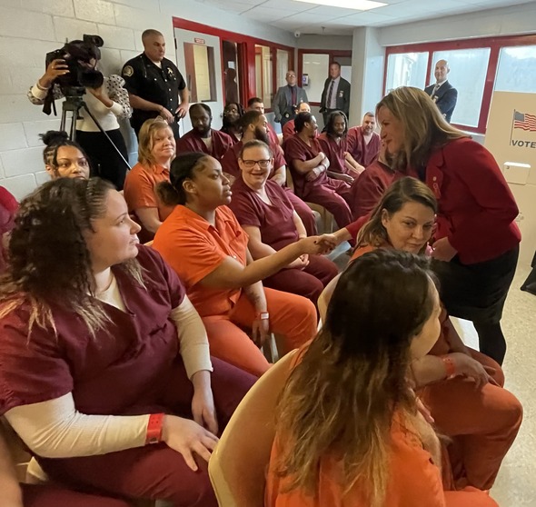 Secretary Benson with I.G.N.I.T.E. program participants at Genesee County Jail 