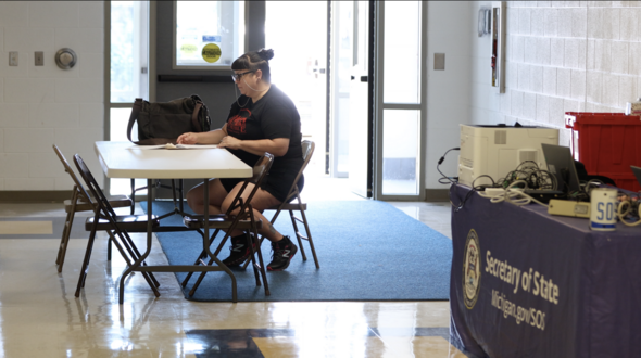 Lisa Week of Detroit takes written driver's exam at St. Clair Shores Road to Restoration clinic 