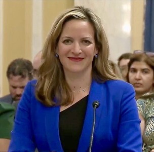 Secretary at hearing