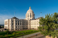 The northeast quadrant of the Minnesota Capitol lit by the morning sun.