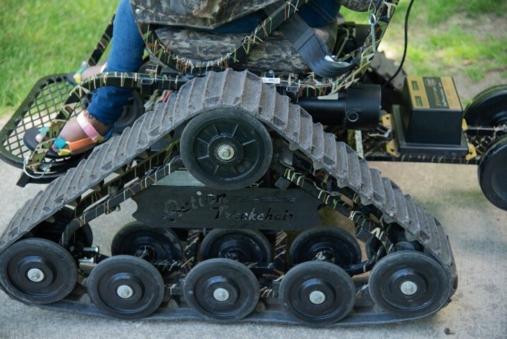 A side view of the wide tread on the all-terrain track chair.