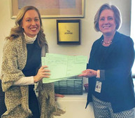 Representative Heather Edelson, LGSW, and BOSW Executive Director Kate Zacher-Pate, LSW, drop House bill into “the hopper”