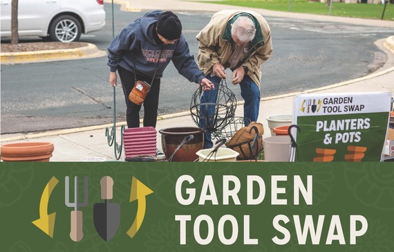 People gathered and trading garden tools and a garden tool swap event. 