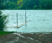 High water levels on Reitz Lake showing a flooded dock