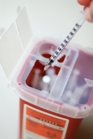 Images of sharps and a bucket