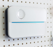 Smart controller panel mounted on a garage wall 