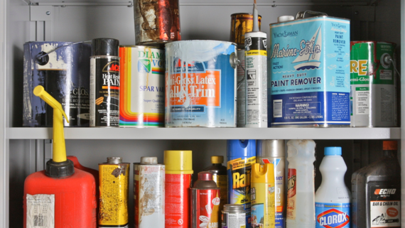 Bottles and containers stored on shelves showing different types of household hazardous waste