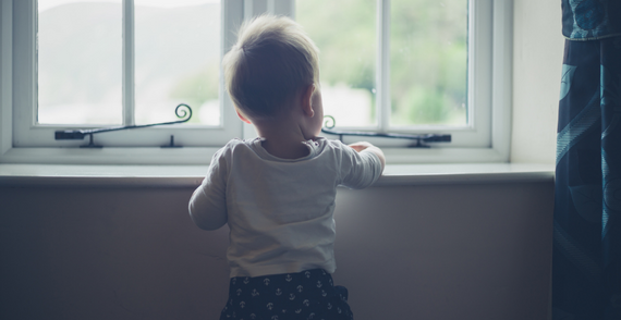 Photo of a boy near a window