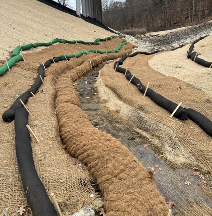 A reconstructed East Chaska Creek with erosion control blankets at mats to stabilize slopes