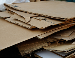 Stacks of flattened cardboard