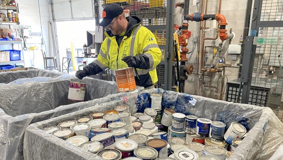 Carver County Environmental Center staff working to sort paint 