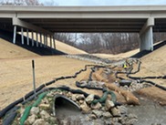 Lyman bridge in Chaska with a stream naturalization project below