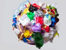 Trash and recyclable items in a circle