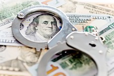 money and handcuffs image