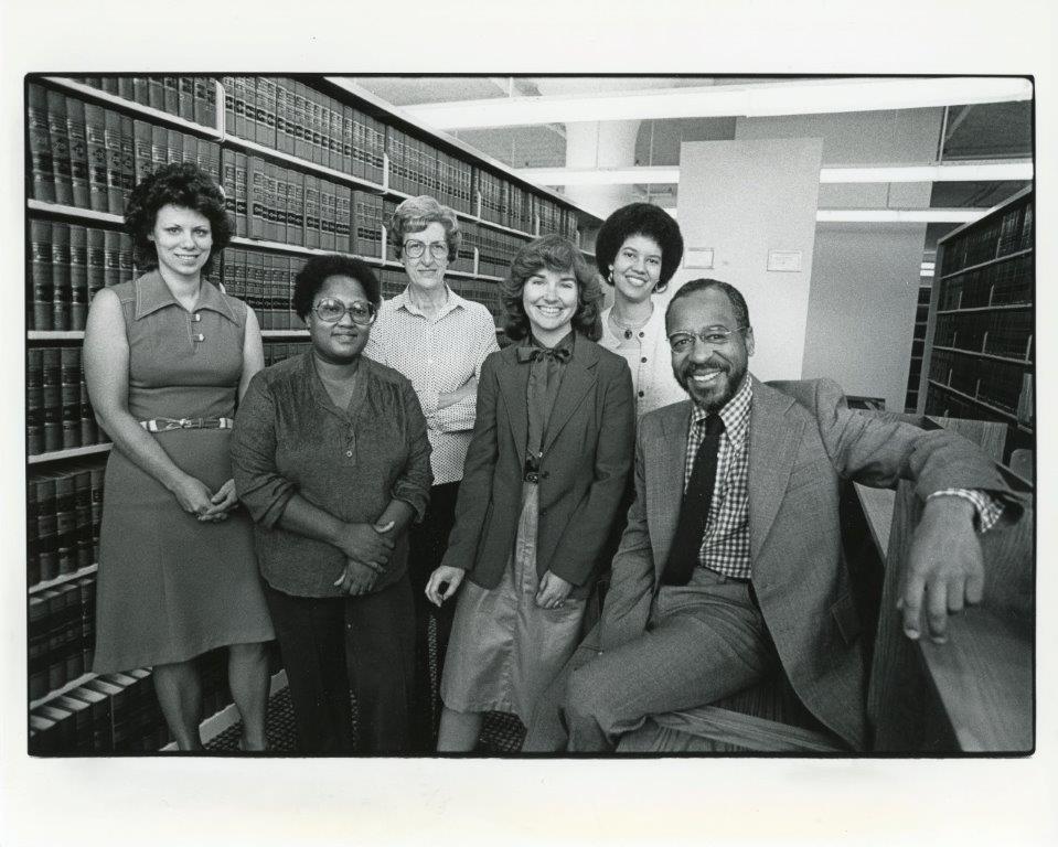 1980s image of library staff in the stacks