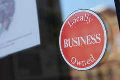 Locally owned small business sign