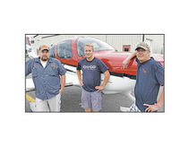 Kristopher Carlson, Ross Robillard and George Virnig are expanding Midwest Aircraft Refinishing at Range Regional Airport in Hibbing. 