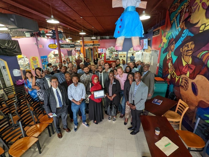 A group standing in Mercado Central in Minneapolis.