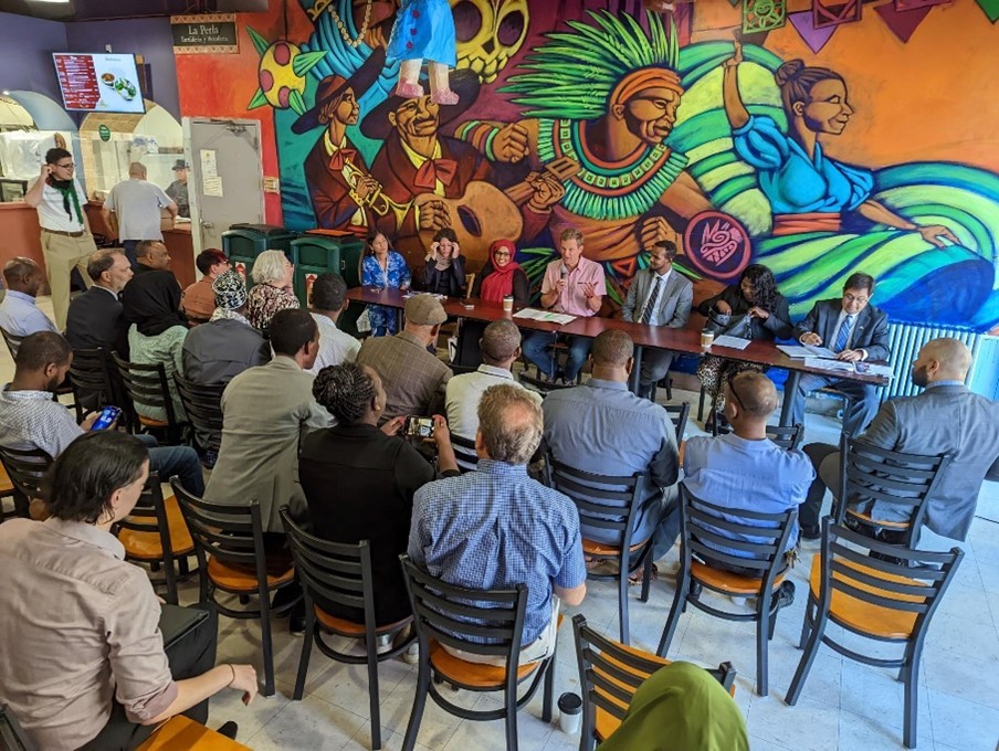 A panel speaks at Mercado Central in Minneapolis.