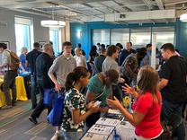 Crowds of job seekers and employers standing in a large room at Minneapolis Job and Resource Fair 9-25-25