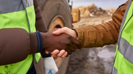 Handshake at a construction site