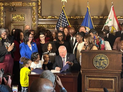 Governor Walz signing the CROWN Act
