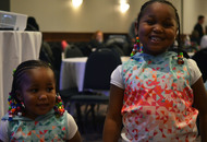 Adopted sisters Araya, 2, and Alani, 5, love having their pictures taken.