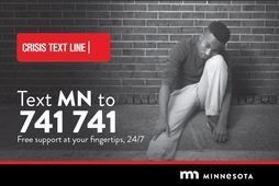 young man with his head on knee