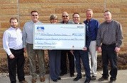 Seven MSH employees hold large rebate check