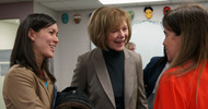 Assistant Commissioner Nikki Farago and Sen. Tina Smith talk with Louise Matson, Executive Director of the Division of Indian Work
