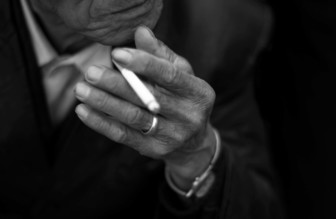 hand holding a cigarette