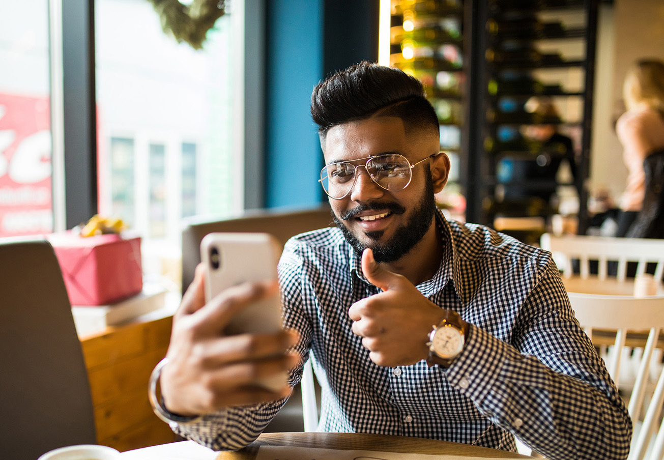 Man video chatting on his mobile phone
