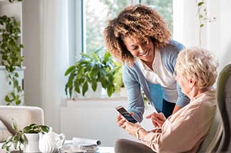 elderly person with caregiver