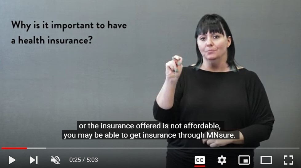 Kelly explaining in ASL why it is important to get health insurance, and the option to get coverage through MNsure.